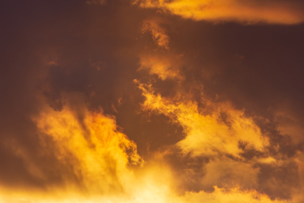 black clouds and orange sky