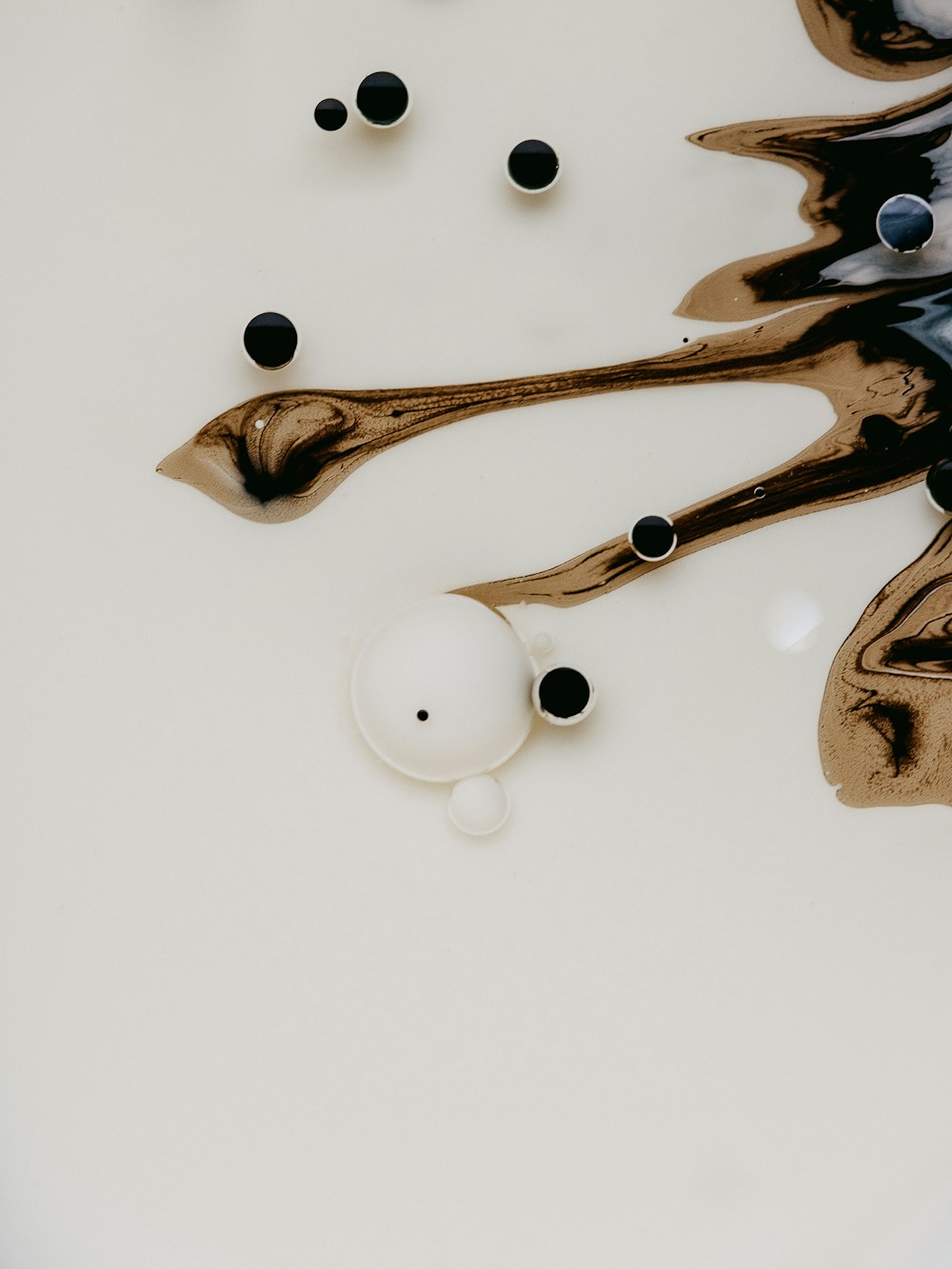 brown and white wooden spoon and fork