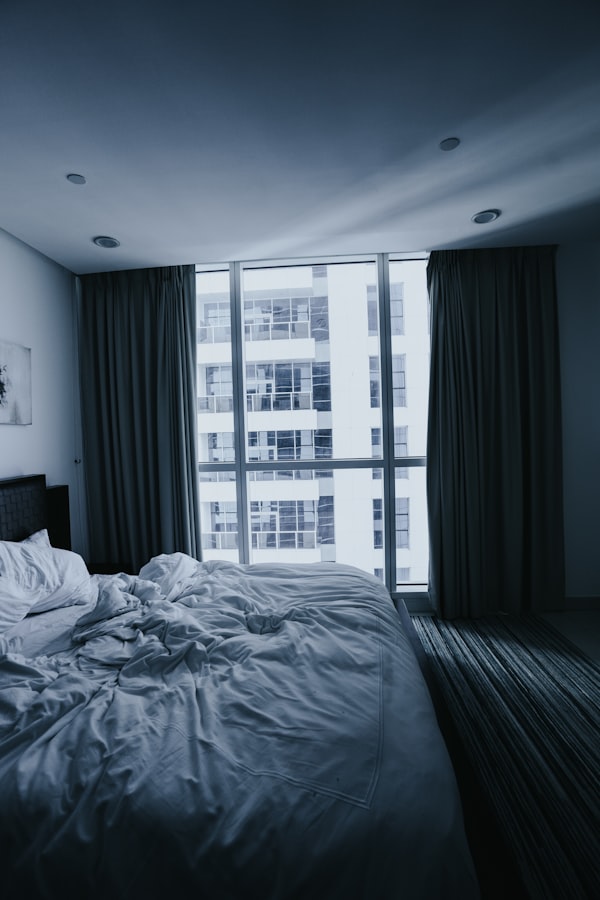Spacious bedroom with walk-in closet and full-length mirror