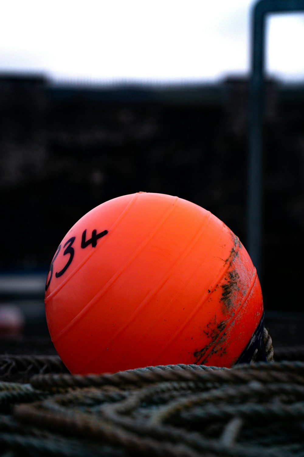 red and white basketball on black and white textile