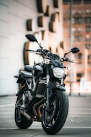 black motorcycle parked on the street