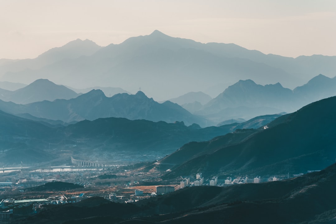 aerial view of city near mountains during daytime