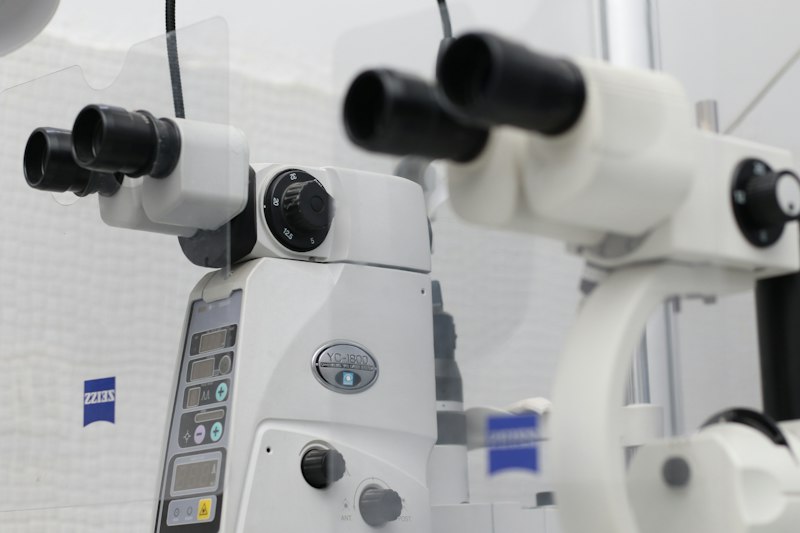 Modern optometry exam room with diagnostic equipment