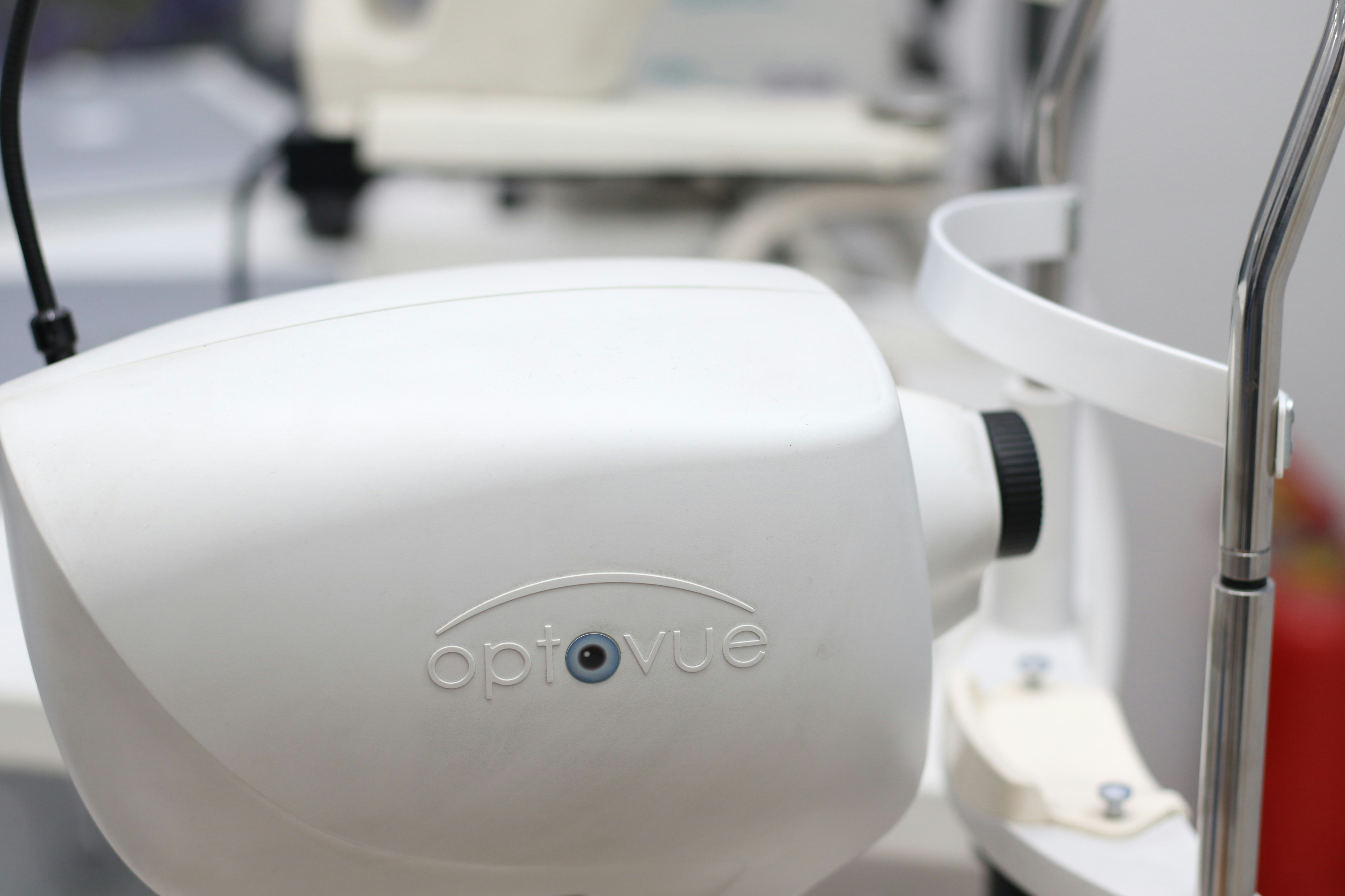 white sony corded headphones on white table