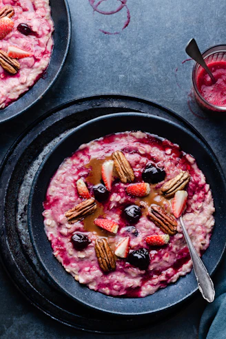 cooked food on black round plate