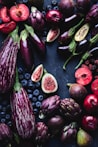 sliced pomegranate fruits on black table