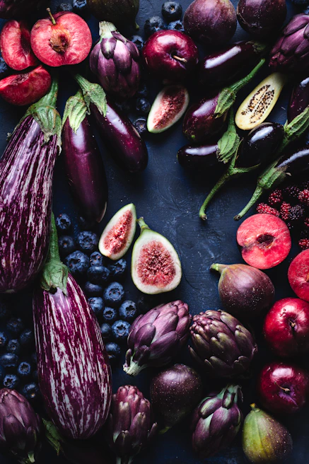 Fresh fruits and vegetables artistically arranged in vibrant colors