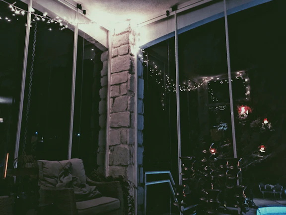 A warm, inviting corner with soft lighting and comfortable seating, perfect for thoughtful conversations.