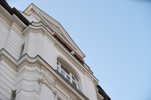 white concrete building under blue sky during daytime