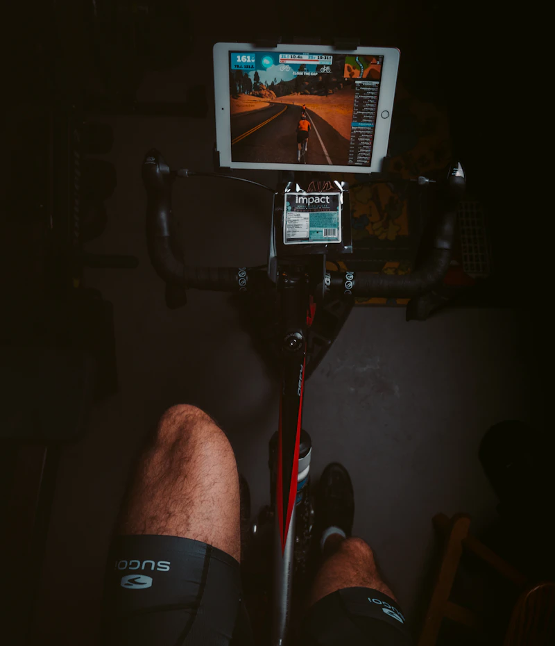 Rider standing on the pedals through a high-resistance Power Ride
