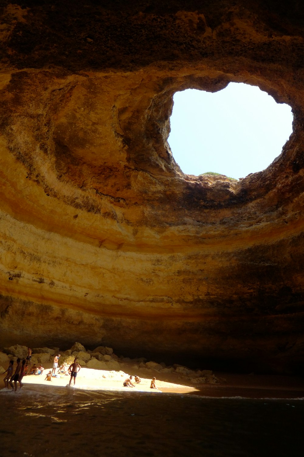 brown and black cave during daytime