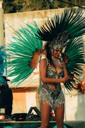 woman in gold and green headdress