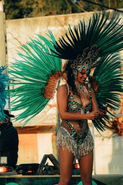 woman in gold and green headdress