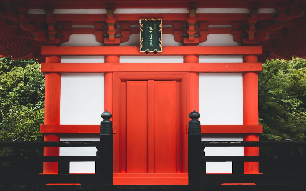 red and white wooden door