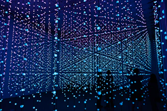 blue and green lights on black background