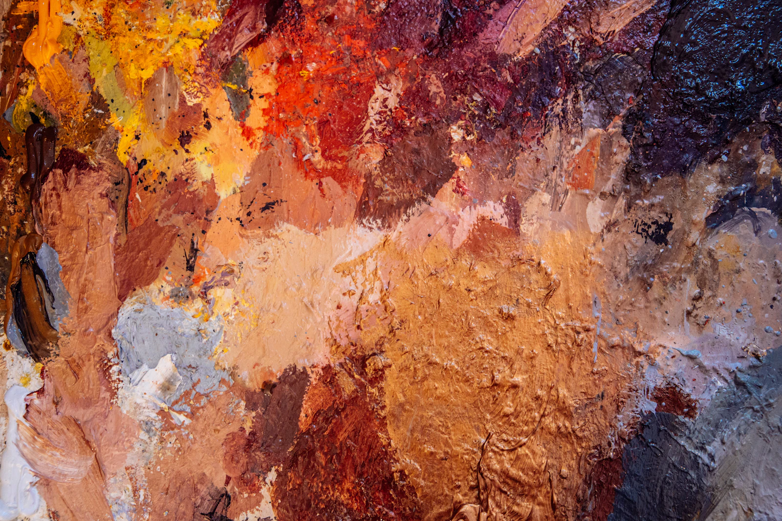 Close-up texture of a brown, red and white abstract painting