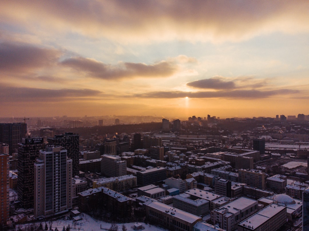 aerial view of city buildings during sunset