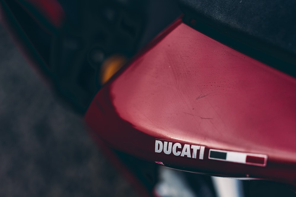 a close up of a red ducati motorcycle