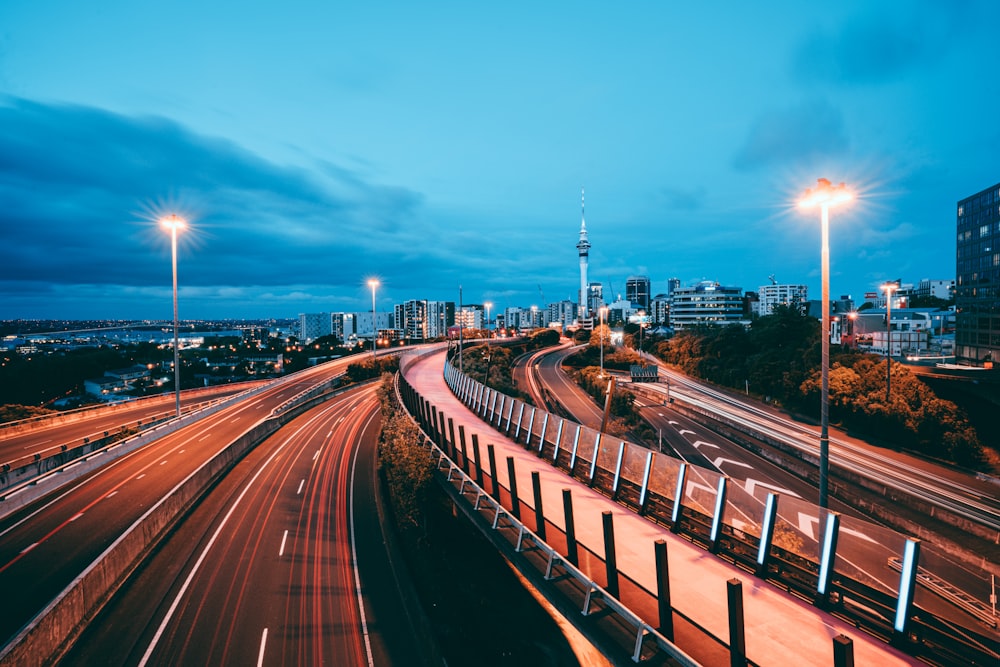 time lapse photography of city road during night time