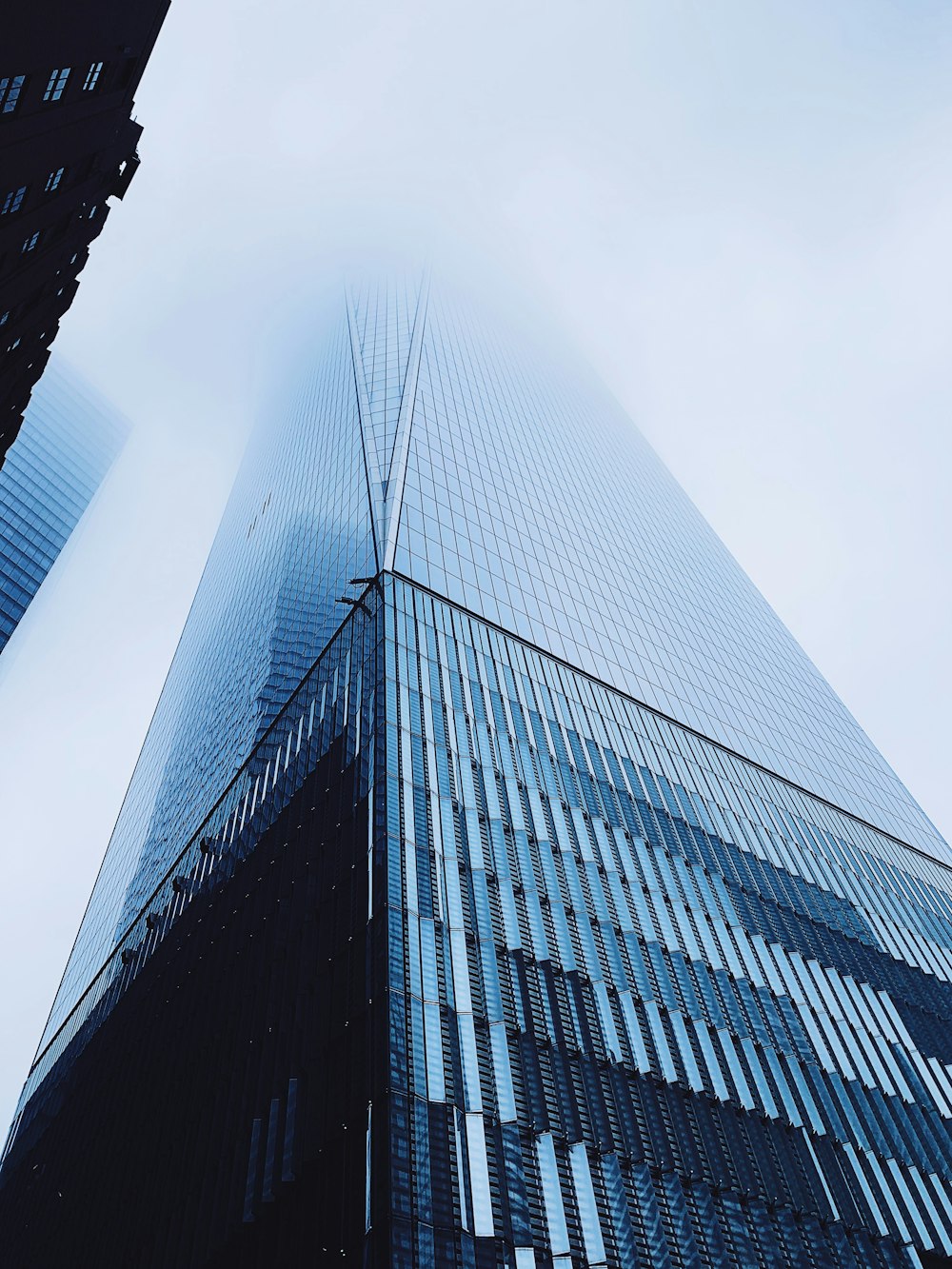 low angle photography of high rise building