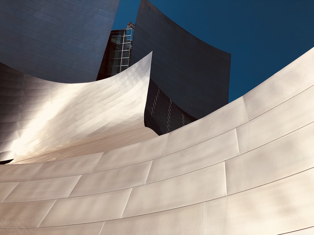 white concrete building under blue sky during daytime