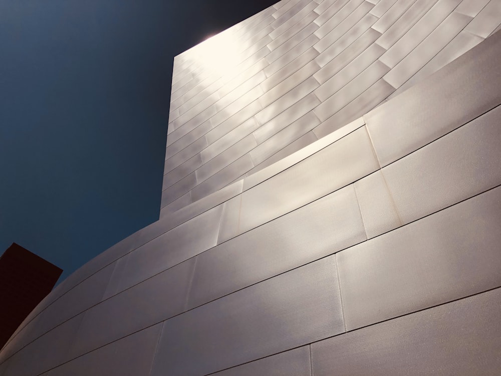 white concrete building under blue sky during daytime