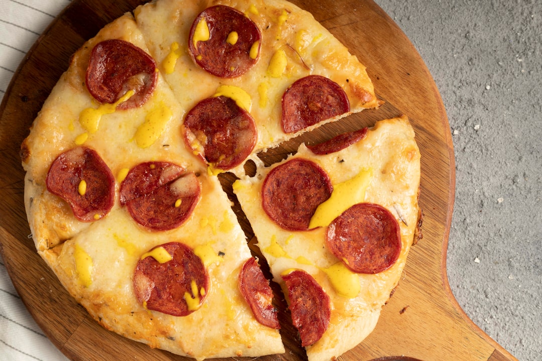 pizza on brown wooden table