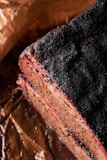 black textile on brown wooden table
