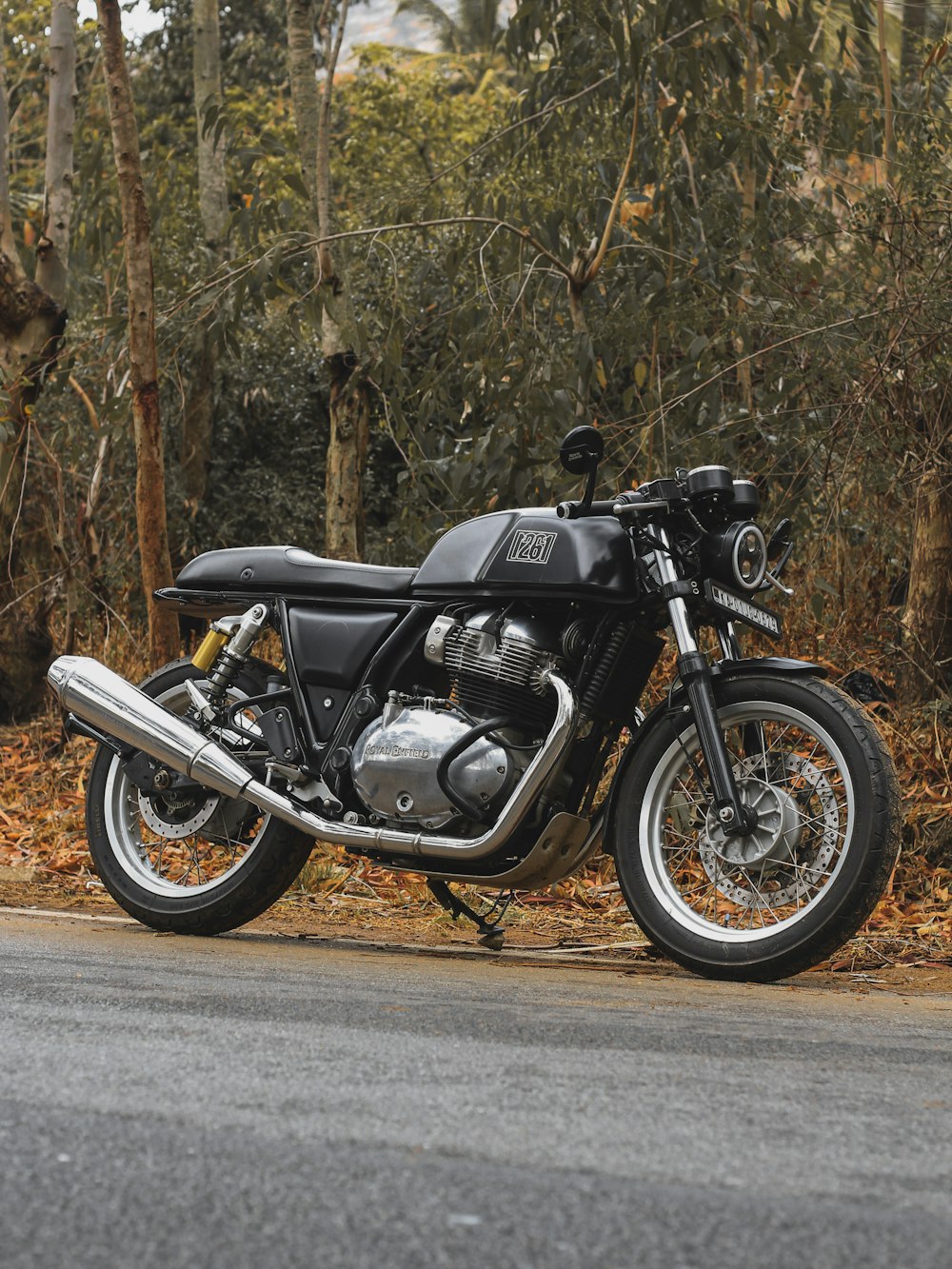 black and silver motorcycle on road