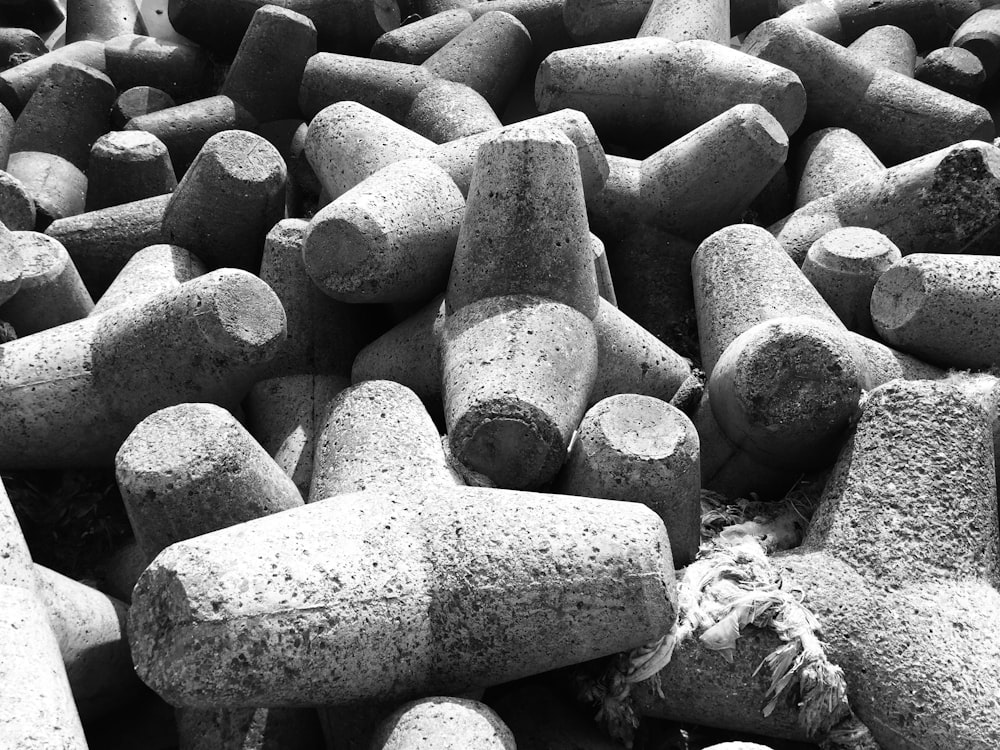 grayscale photo of rocks on ground