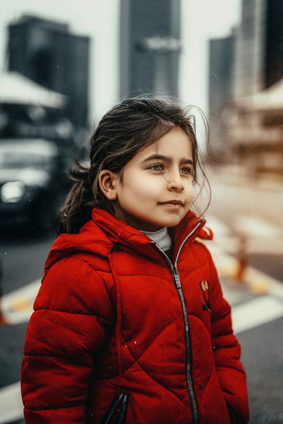 girl in red zip up jacket