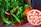 A close-up of fresh ingredients displayed on a wooden table.