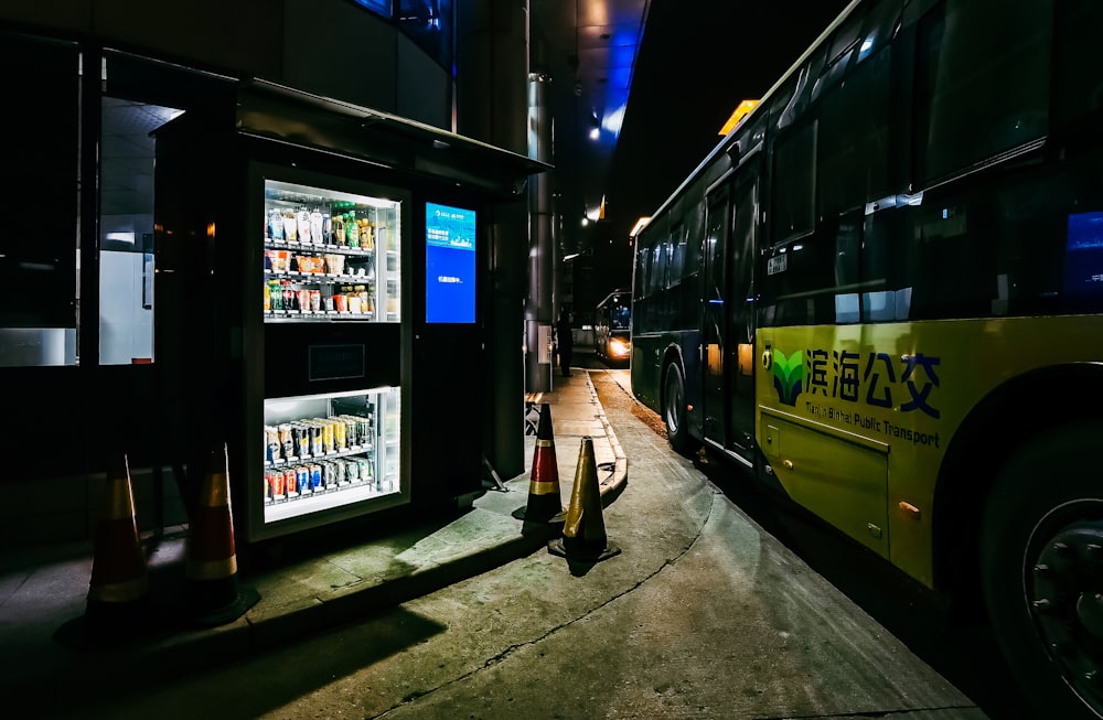 yellow bus on the street during night time