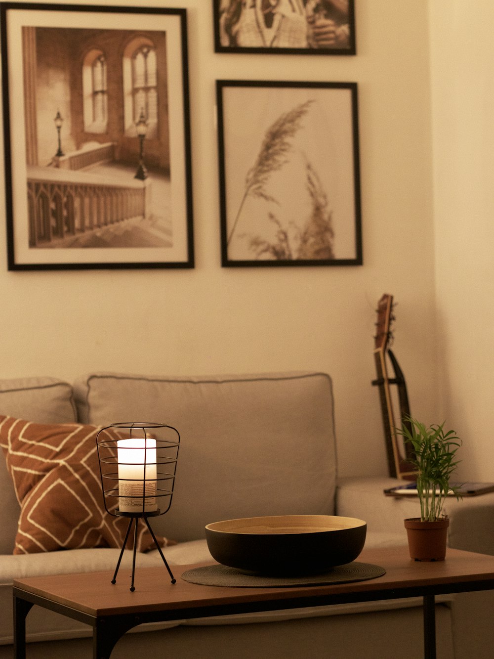 black and white round table beside white and brown sofa