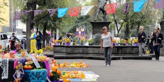 Community gathering in a town square with subtle decorations reflecting local traditions.