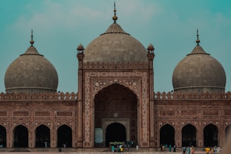 brown dome building under white sky during daytime