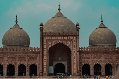 brown dome building under white sky during daytime