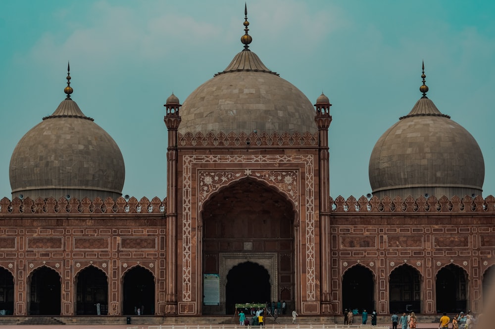 brown dome building under white sky during daytime