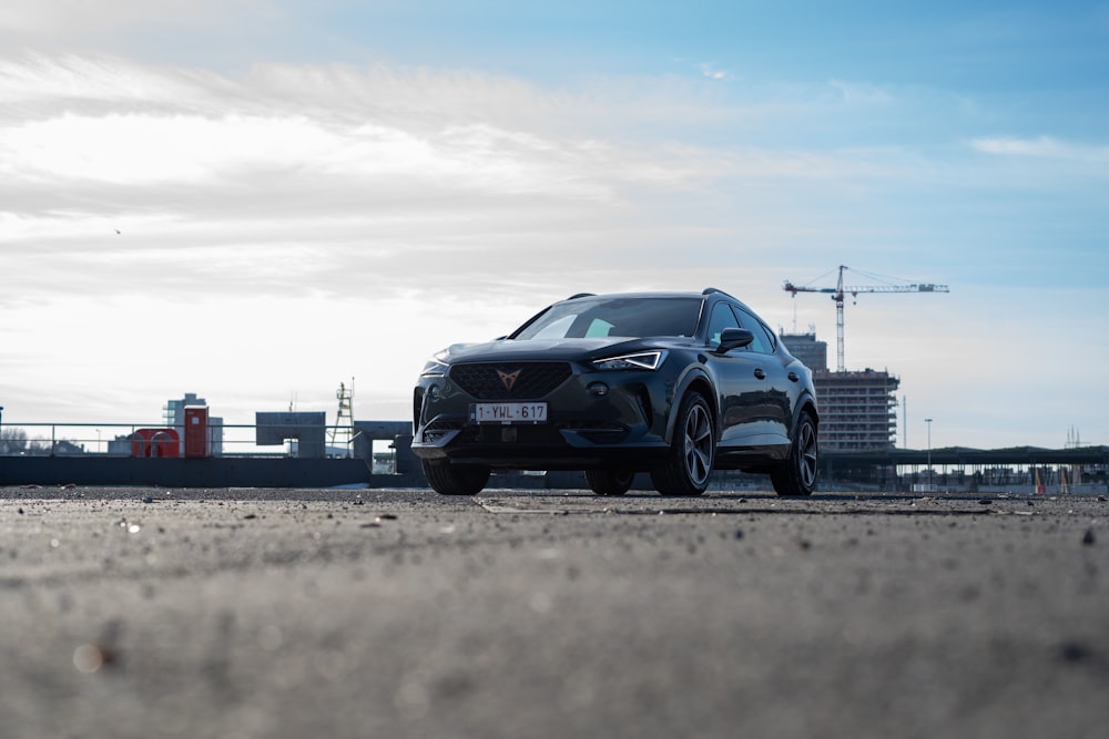 black bmw m 3 coupe on gray asphalt road during daytime