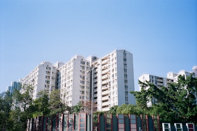 white concrete building under blue sky during daytime