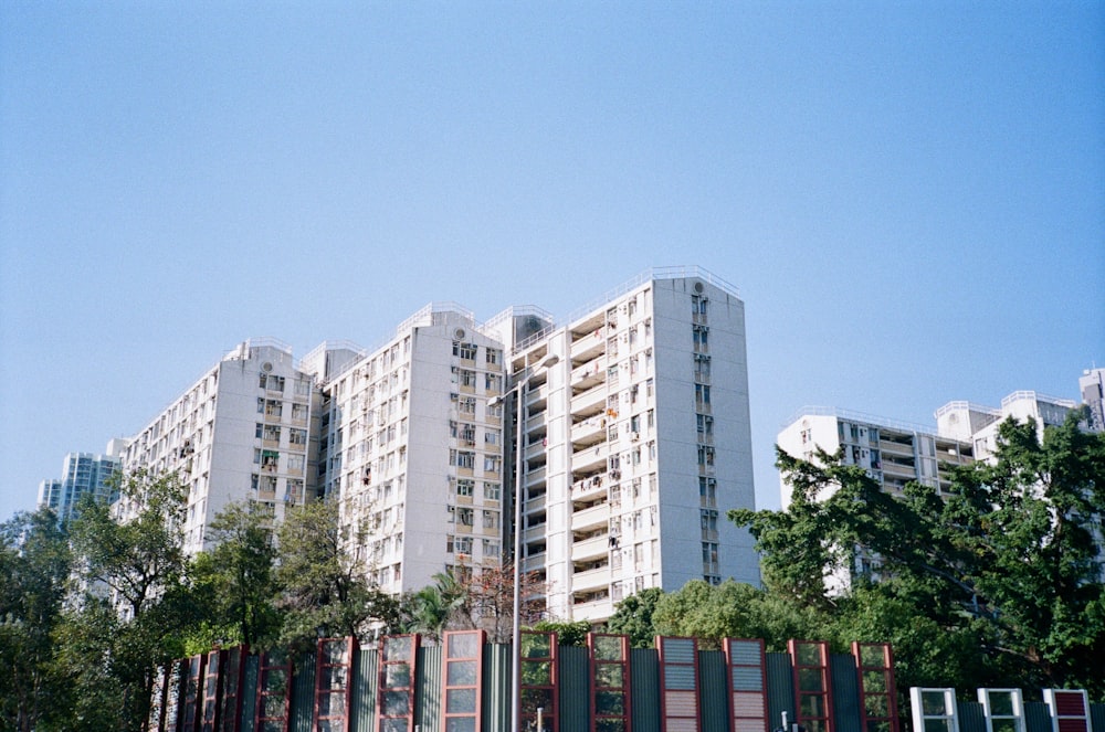 white concrete building under blue sky during daytime