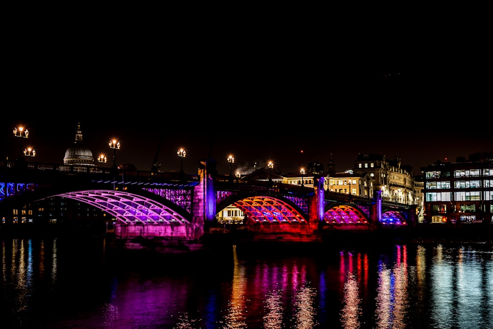 bridge over water during night time