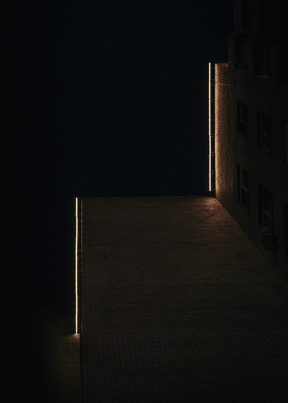 brown brick building during night time