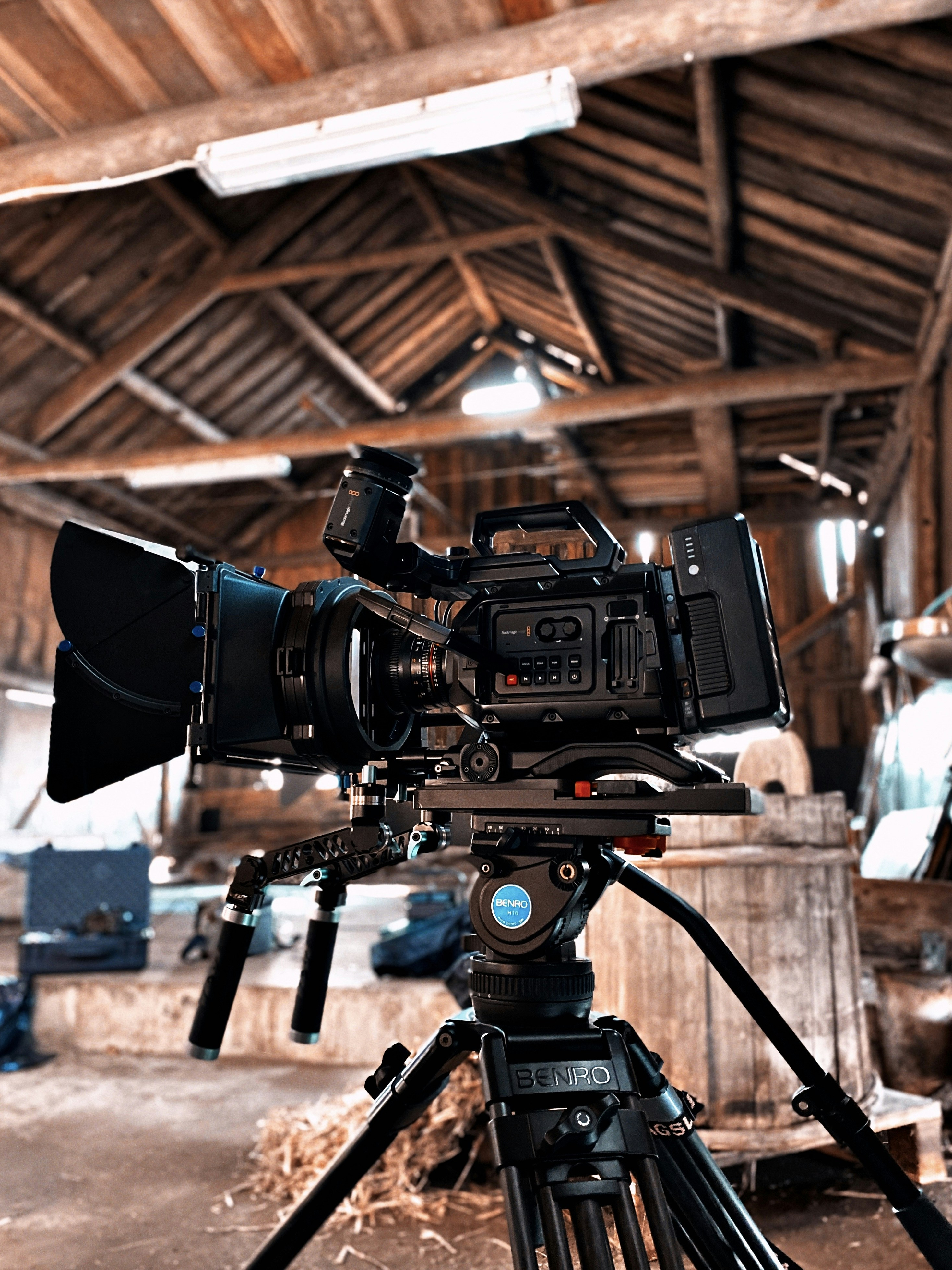 black dslr camera on black tripod