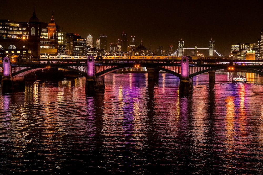 bridge over water during night time