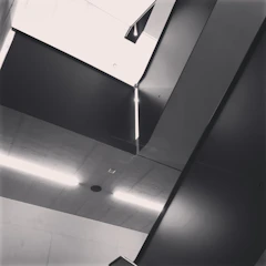 Industrial warehouse interior showcasing silver steel reinforcements and minimalist design.