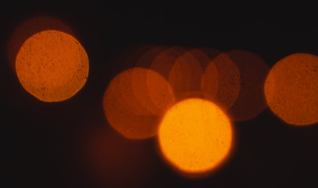 orange and black bokeh lights