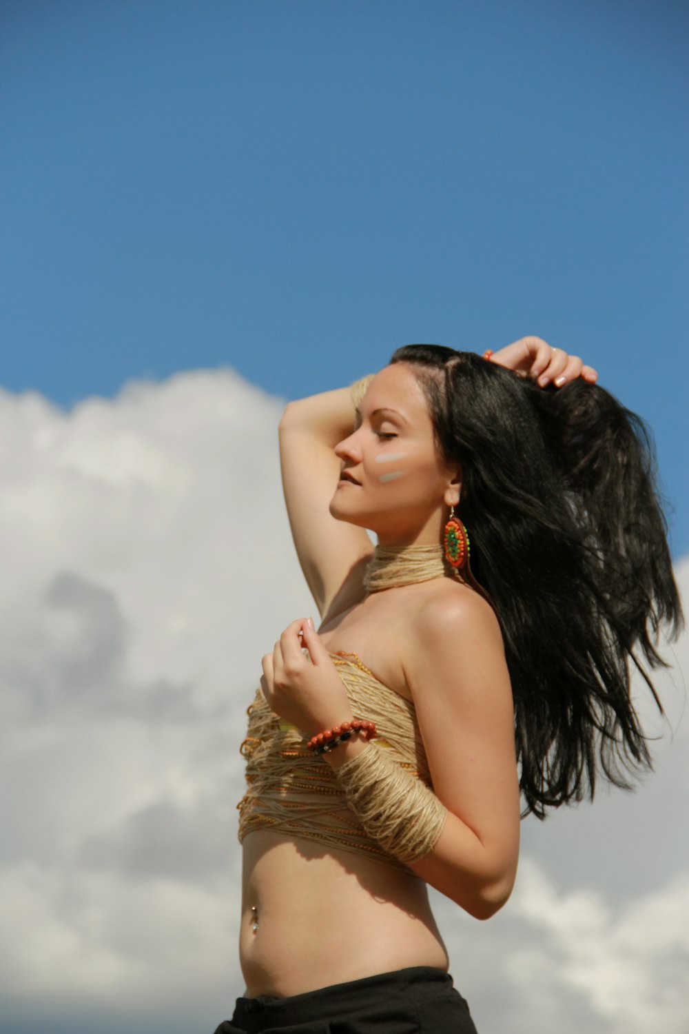 woman in brown sleeveless dress