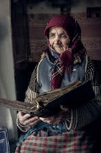 man in red and black scarf