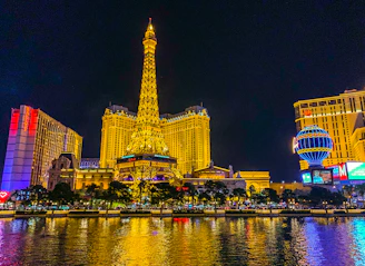 A sleek nighttime cityscape of Paris with the Eiffel Tower illuminated, symbolizing opportunity and prestige.